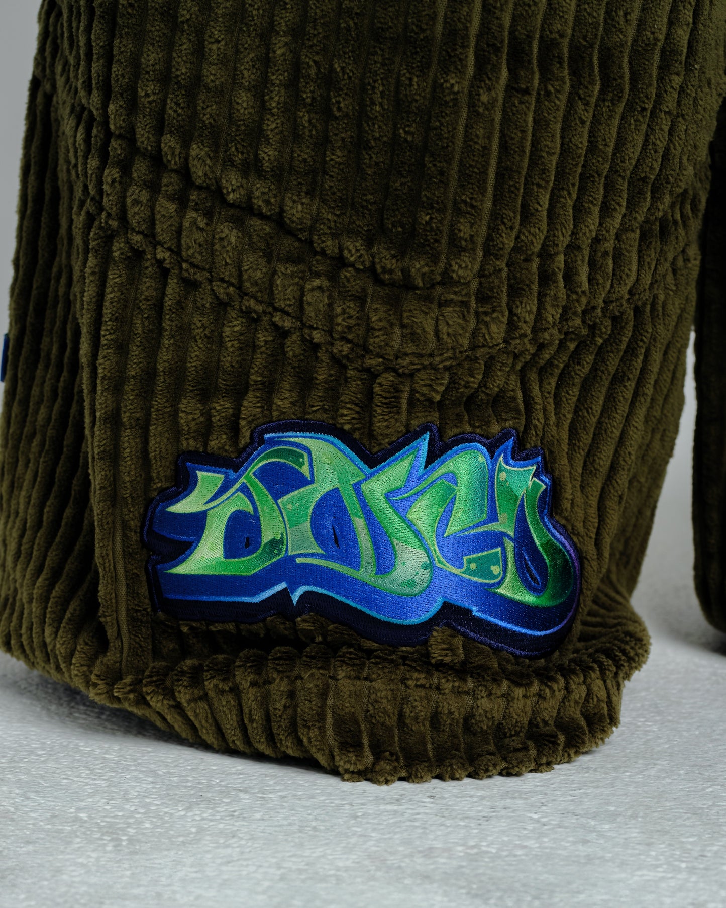 Hangin'. 34". 2 Wale Corduroy. Moss.